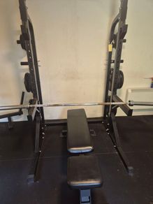 COMPLETE gym setup squat rack + barbell + over 200kg worth of plates and adjustable bench