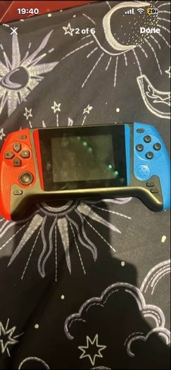 Small handheld gaming device with 500 games