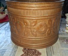 Beautiful Antique Copper Cachepot or Planter, commonly used to hold flower pots. It features embossed repousse decoration showing floral motifs and foliage. Postage Available or collection,