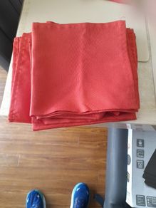Six rust coloured napkins