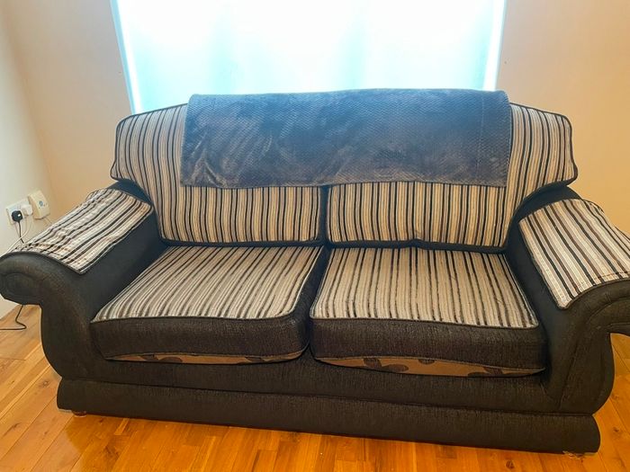 Two three seater sofas