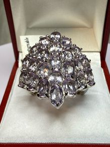 Silver ring with amethysts.