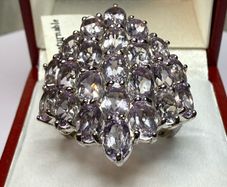 Silver ring with amethysts.