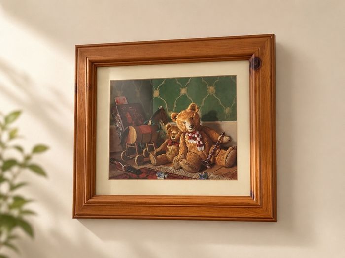 Vintage style framed teddy bear print in a warm wooden frame