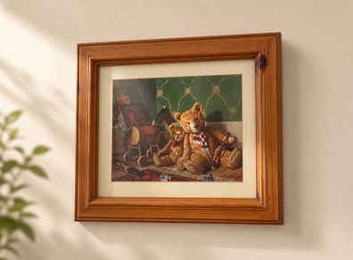 Vintage style framed teddy bear print in a warm wooden frame