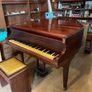 a circa-1931 Monington & Weston baby grand with matching stool. Image 2