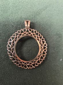 Gold sovereign pendant