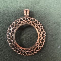 Gold sovereign pendant