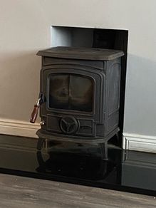 Stanley stove and black hearth