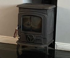 Stanley stove and black hearth