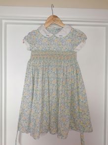 Little Larks smocked dress, age 8. Matching hairband included.