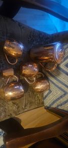 Copper pitcher, 4 cups and measuring cup