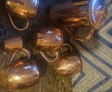 Copper pitcher, 4 cups and measuring cup