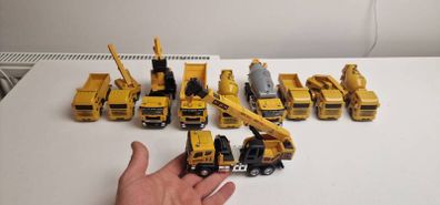 Construction vehicles toys set 10 pieces.