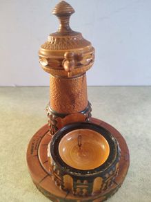 storage water well souvenirs of carved wood marked templo tibidabo from Spain