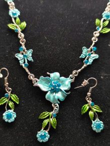 Beautiful blue floral style jewellery set New . Postage is included in price