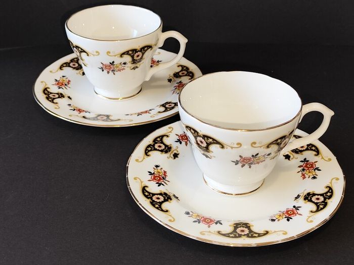 A Pair of Royal Sutherland Bone China Teacups and Saucers in the Balmoral Pattern