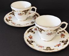 A Pair of Royal Sutherland Bone China Teacups and Saucers in the Balmoral Pattern