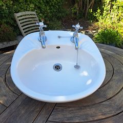 Handbasin with taps