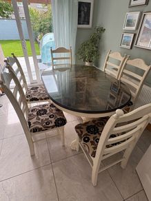 Oval dining table with 6 chairs