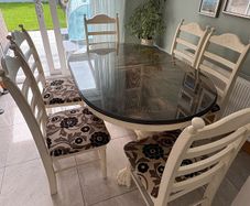 Oval dining table with 6 chairs