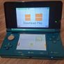 Red Nintendo 3DS xl and Aqua Blue Nintendo 3DS Image 2