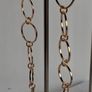 Elegant Gold Starburst Disc & Link Earrings Image 10