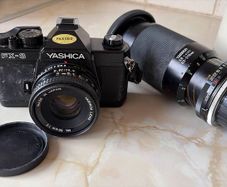 Yashica FX-3 film camera with 50mm lens and Tamron 80-210mm lens
