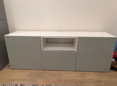 White TV unit with grey-green doors