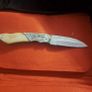 lock knife wolfhead decorative and bone handle Image 2