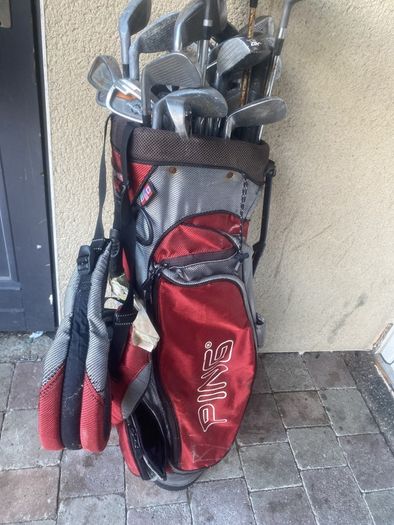 ping bag comes with a mix of golf clubs