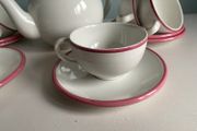 Bargain as new modern teaset with Teapot with six cups and saucers with pink trim
