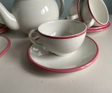 Bargain as new modern teaset with Teapot with six cups and saucers with pink trim