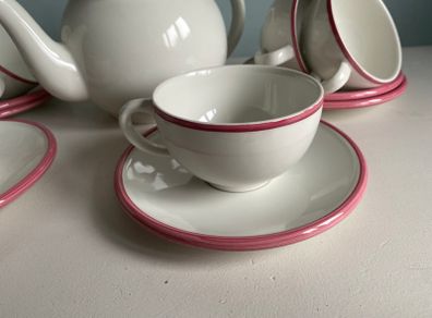 Bargain as new modern teaset with Teapot with six cups and saucers with pink trim