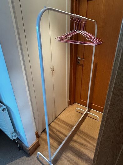 Clothing rail, hangers and storage boxes