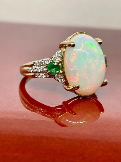 Gold Rind with Opal, Emerald and Moissanite