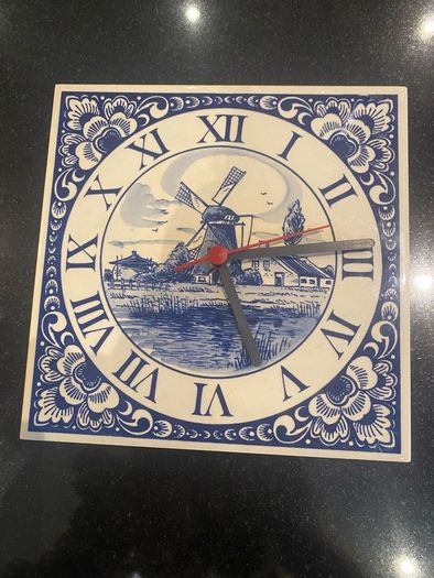Blue tile clock with windmill