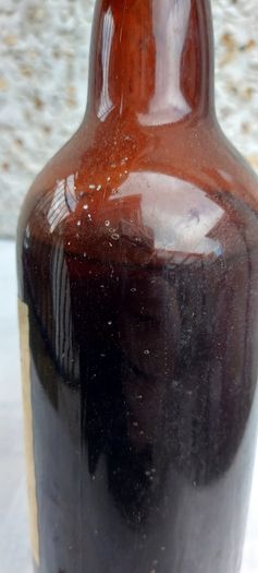 vintage bottle of winters tale sherry 3/4 full ,found in a old pub closed down,