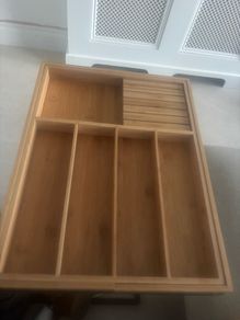 Set of two cutlery drawer organisers.