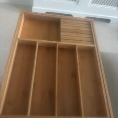 Set of two cutlery drawer organisers.