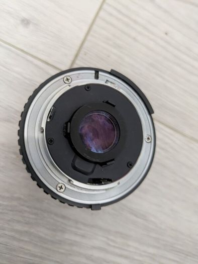 Nikon Series E 28mm f/2.8 manual focus wide-angle prime lenses.