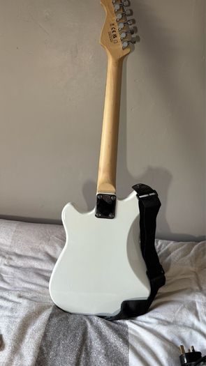 White electric guitar with amp box used only twice
