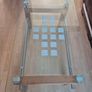 Glass table with wooden base Image 2