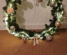 Large outdoor green Christmas wreath decorated