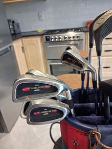 golf clubs and bag