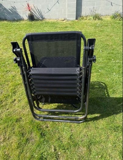2 black recliner garden chairs