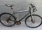 Carrera hybrid flat bar road bike
