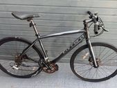 Carrera hybrid flat bar road bike
