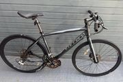 Carrera hybrid flat bar road bike