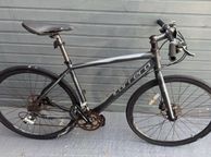 main image for ad Carrera hybrid flat bar road bike